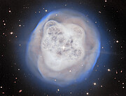 Gaze into the Crystal Ball Nebula and See the Light Emitted by a Dying Star 1500 Years Ago